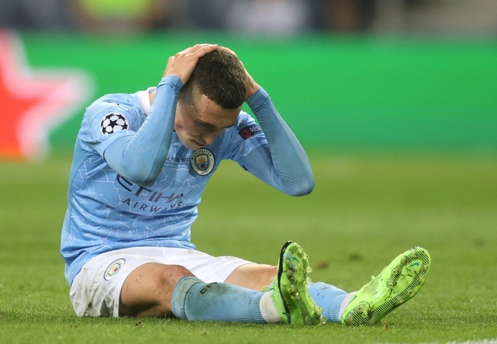 Foden will miss City's start to the season. AFP