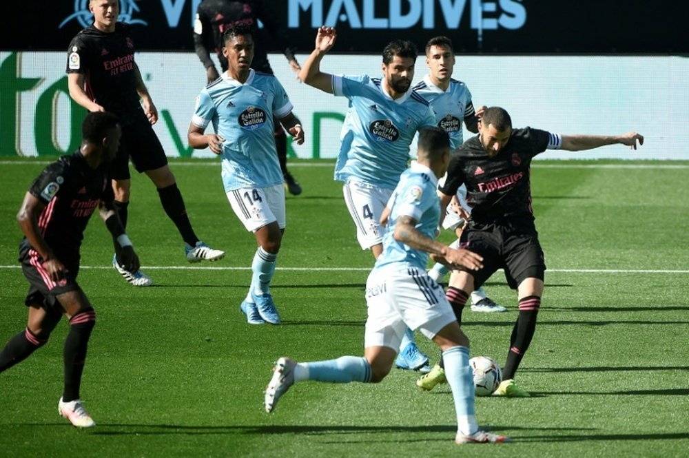 Karim Benzema got a brace as RM beat Celta 1-3. AFP