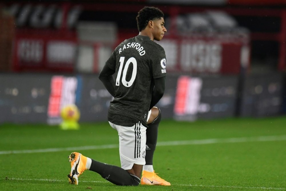 Taking a knee is set to continue before English matches. AFP