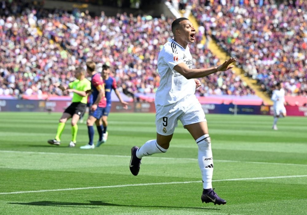Real Madrid's French forward Kylian Mbappe hit a Clasico hat-trick but to no avail. AFP