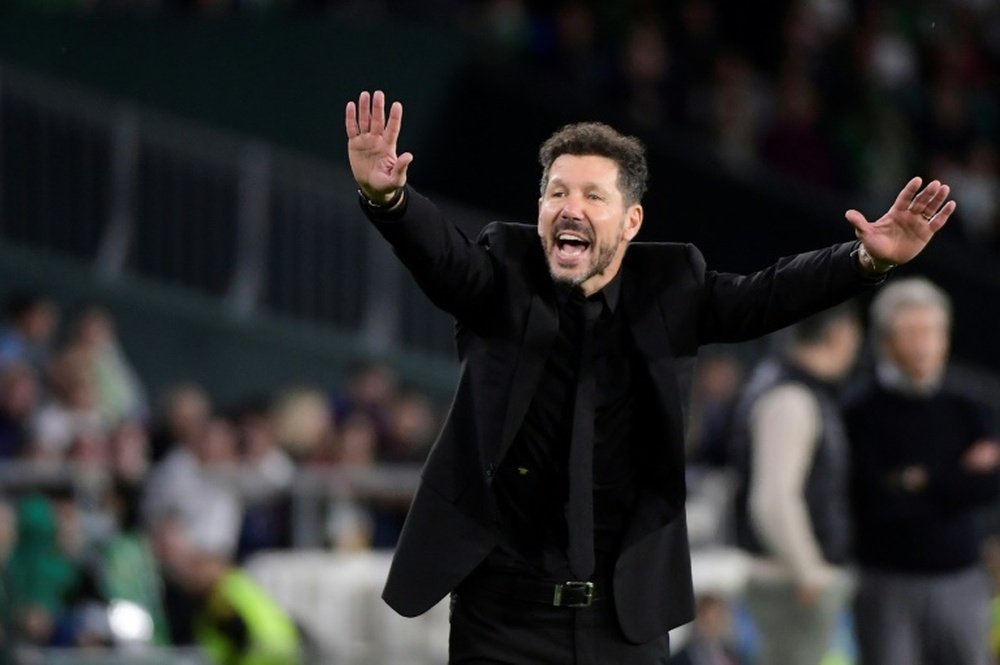 Simeone says all La Liga matches should have been postponed out of respect to flood victims. AFP