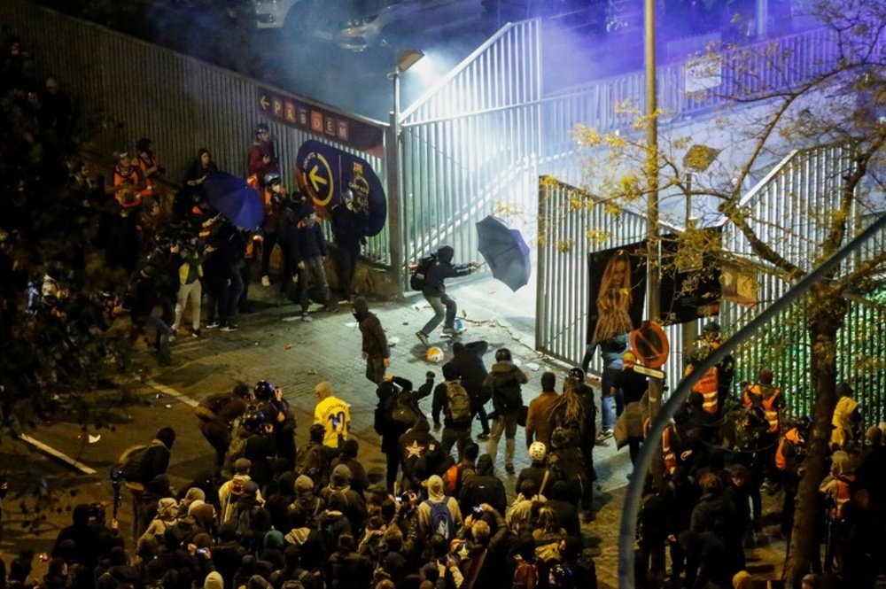 Ten people were arrested following clashes outside the Camp Nou. AFP