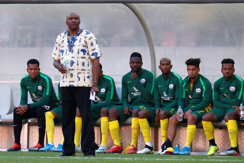 Molefi Ntseki (standing) was sacked on Wednesday as South Africa coach. AFP