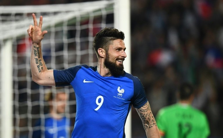 Frances forward Olivier Giroud celebrates after scoring a goal. AFP