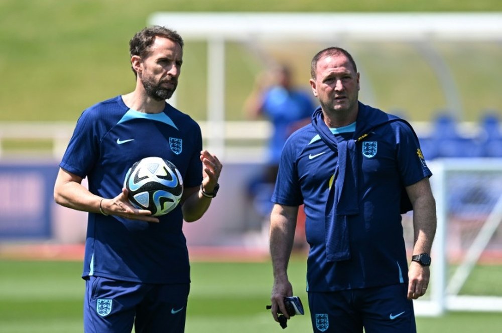Southgate (L) does not want his players to focus on transfer speculation over the summer. AFP