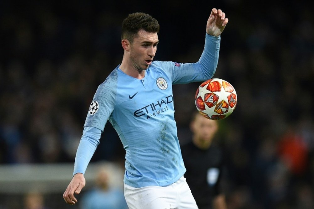 Guardiola says up to 'incredible' Laporte to win France call. AFP