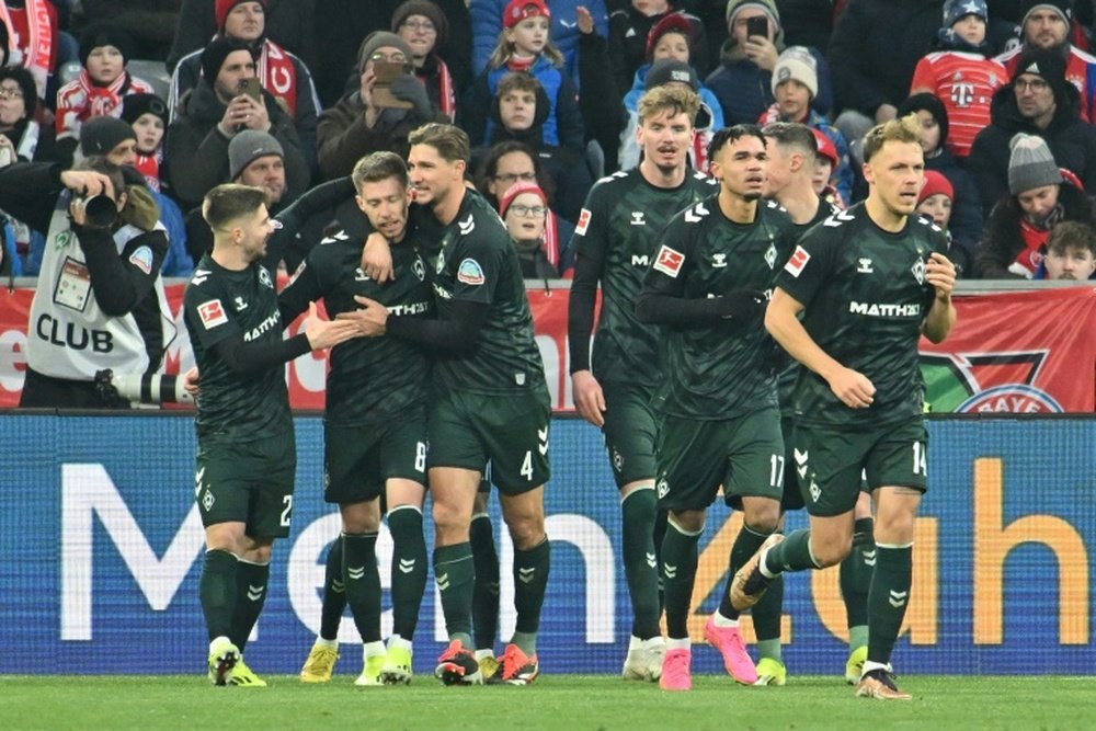 Bremen defender Mitchell Weiser (2ndL) scored for his team on Sunday. AFP