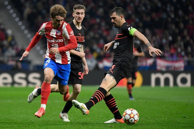 ï»¿Late Milan winner stuns Atletico and throws qualification race open