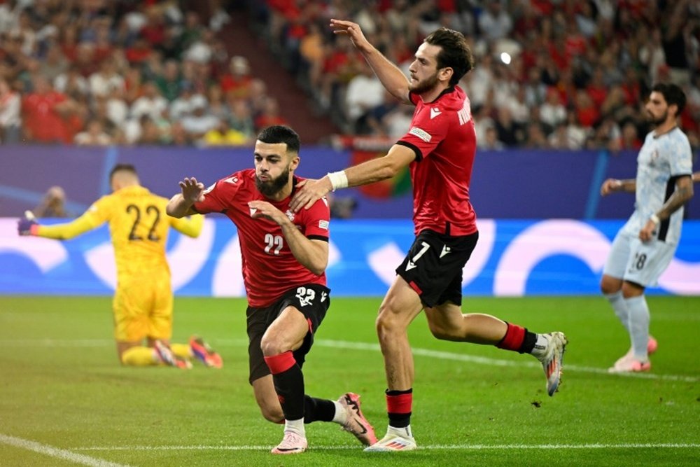 Mikautadze and Kvaratskhelia scored the goals which took Georgia to the last 16. AFP