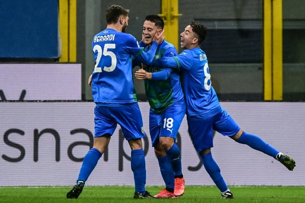 Domenico Berardi (L) scored to keep Sassuolo's Europa League dreams alive. AFP