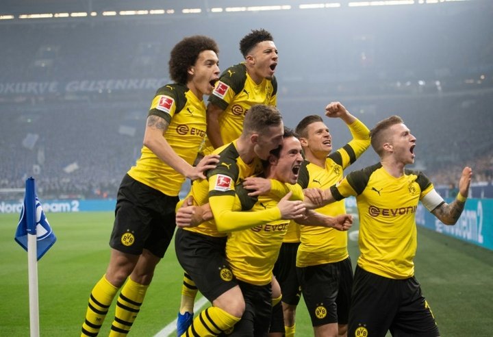 Sancho seals Dortmund derby win as Bayern move second