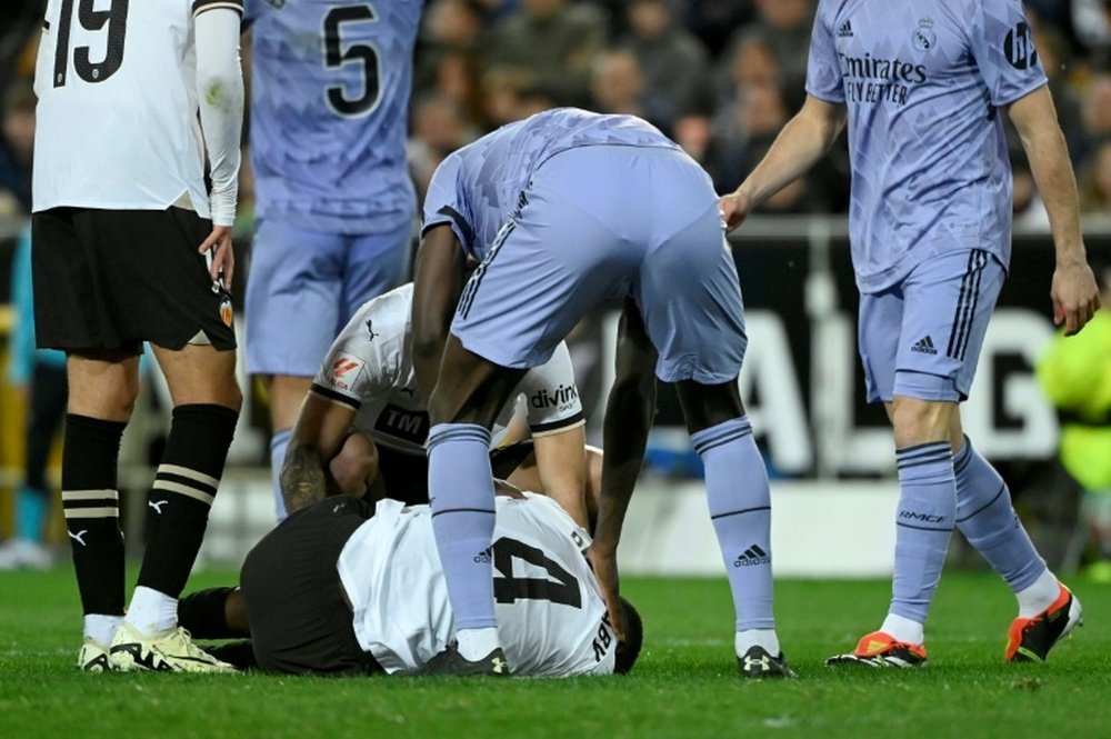 Diakhaby suffered a serious knee injury playing for Valencia against Real Madrid. AFP
