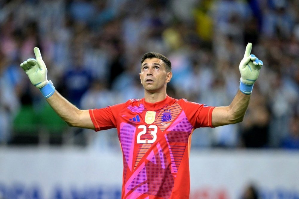 Emiliano Martinez saved two penalties to send Argentina into Copa semis. AFP