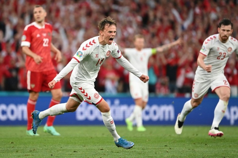 Mikkel Damsgaard was delighted after Denmark qualified for the last 16. AFP