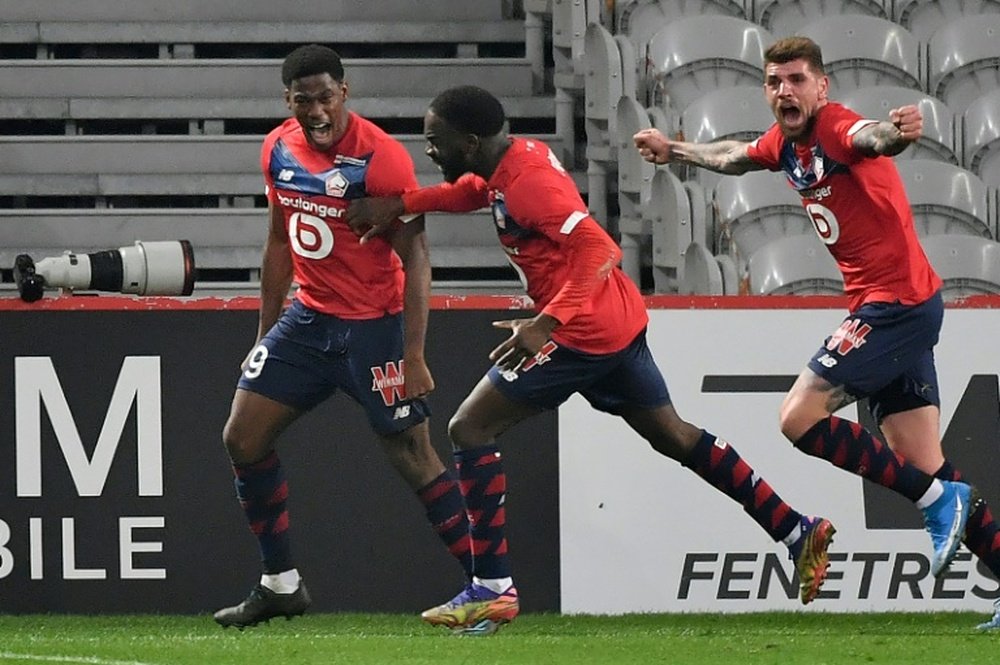 David (L) scored twice for Lille against Marseille. AFP