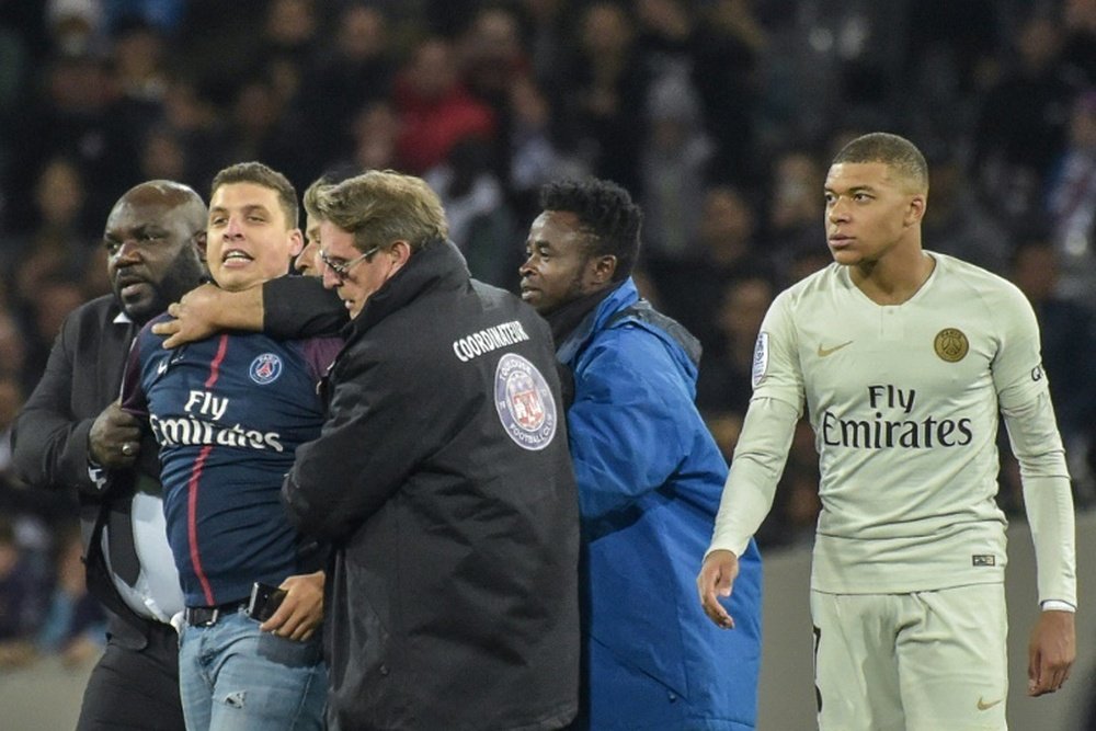 Snap judgment: fan who took selfie with Mbappe fined and banned. AFP