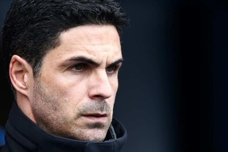 Mikel Arteta's Arsenal are involved in a three-way Premier League title race. AFP