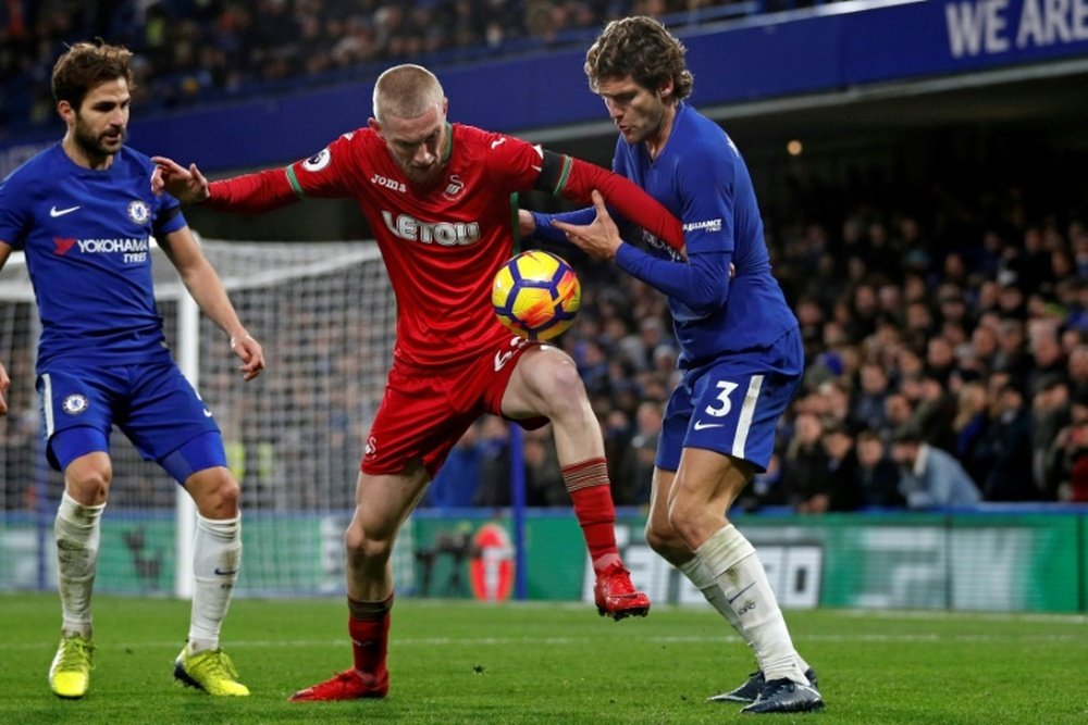 McBurnie (C) was heard telling teammates he did not want to play for Scotland. AFP