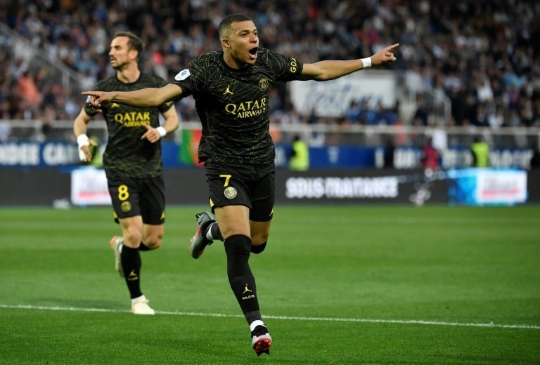 A brace by Kylian Mbappe propelled Paris Saint-Germain to a 2-1 win at Auxerre on Sunday that effectively secured a second straight Ligue 1 title and a ninth in the last 11 seasons.