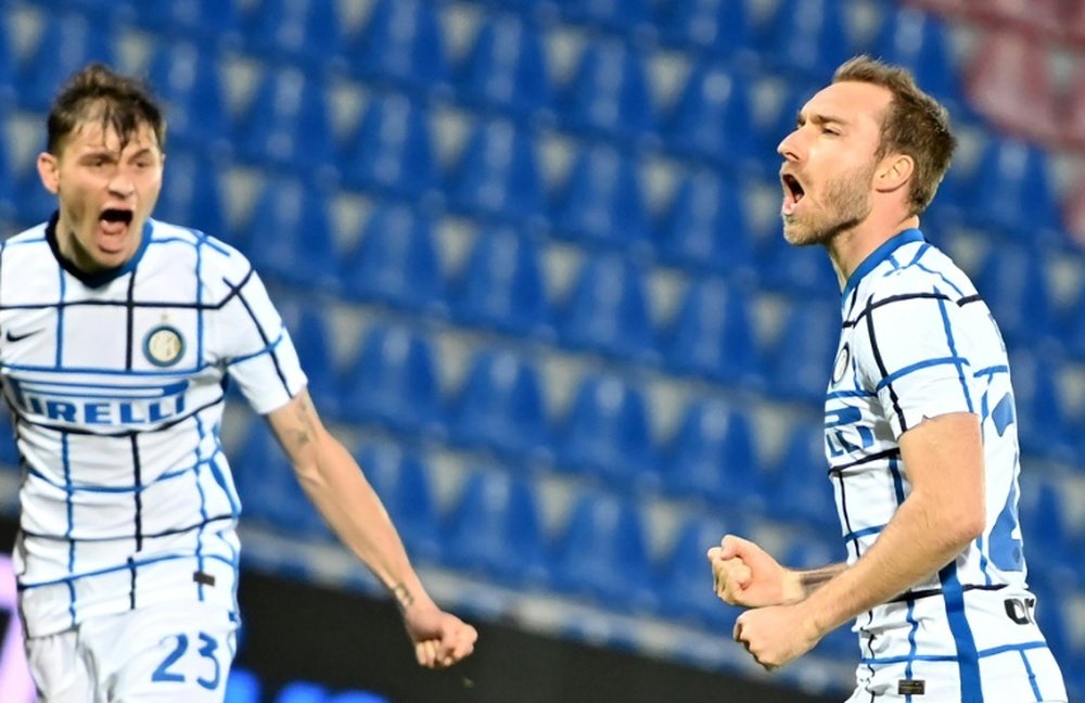 Christian Eriksen (R) scored as Inter beat Crotone. AFP