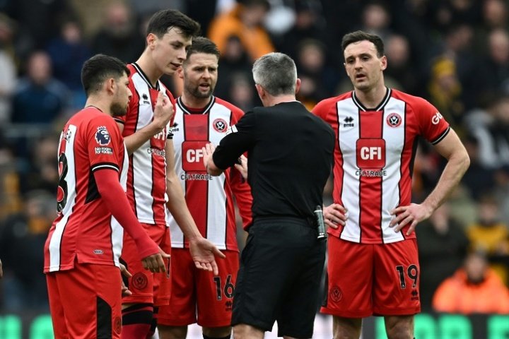 Sheffield Utd players square off in defeat at Wolves