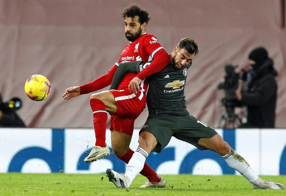 Man Utd retain top spot after Liverpool stalemate. AFP