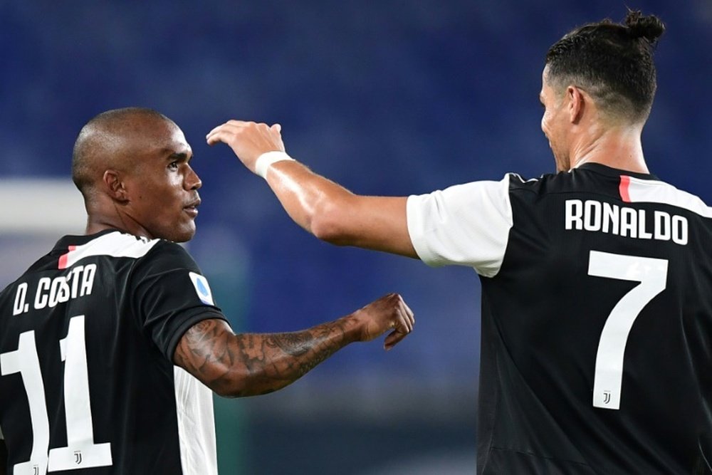 Douglas Costa (L) will play in the A-League for Sydney FC next season. AFP