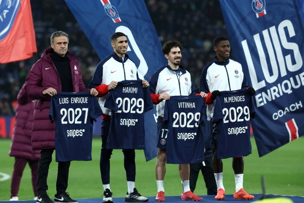 Luis Enrique and three players have renewed their PSG contracts. AFP