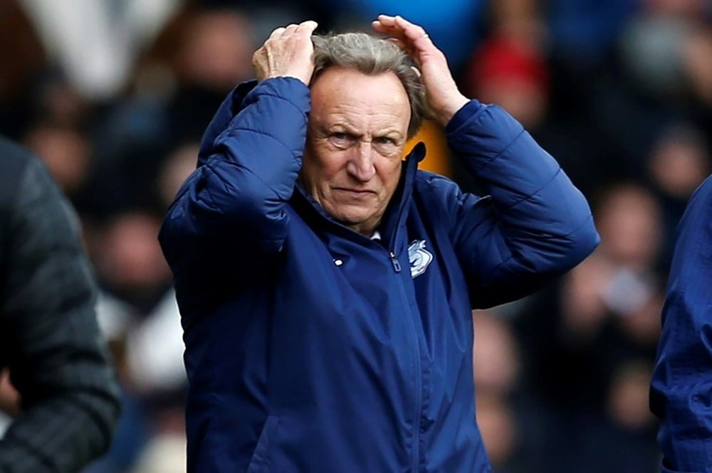 Neil Warnock's Cardiff lost to Wigan. AFP