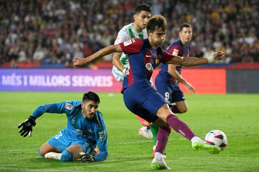 The 'Joaos' made their Barca debuts and scored one goal each. AFP