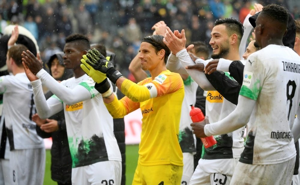 Moenchengladbach go top with Augsburg thrashing. AFP