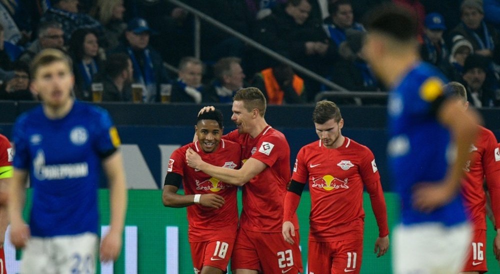 Halstenbervg (C) scored in Leipzig's 0-5 thumping of Schalke. AFP