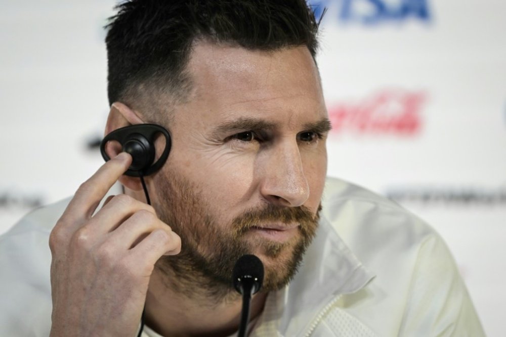 Lionel Messi is about to kick-off his opening match. AFP