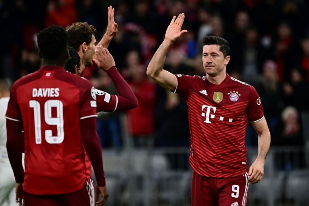 Robert Lewandowski celebrates his early goal for Bayern Munich. AFP