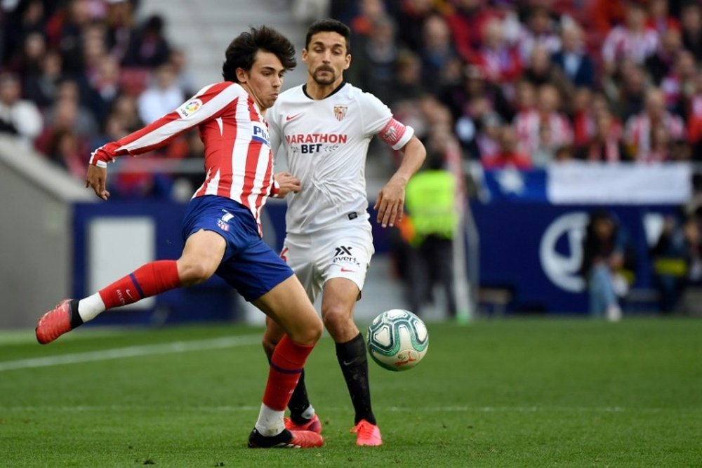Joao Felix (L) netted in Atletico's draw with Sevilla. AFP