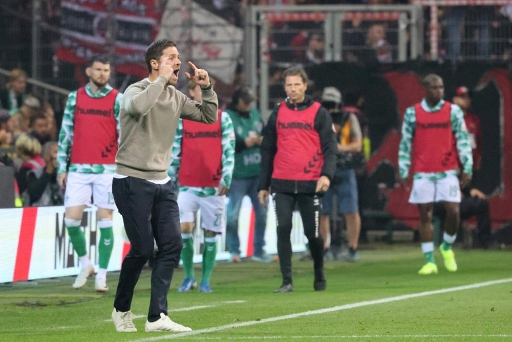 Alonso said his side still had hope of defending their Bundesliga title. AFP