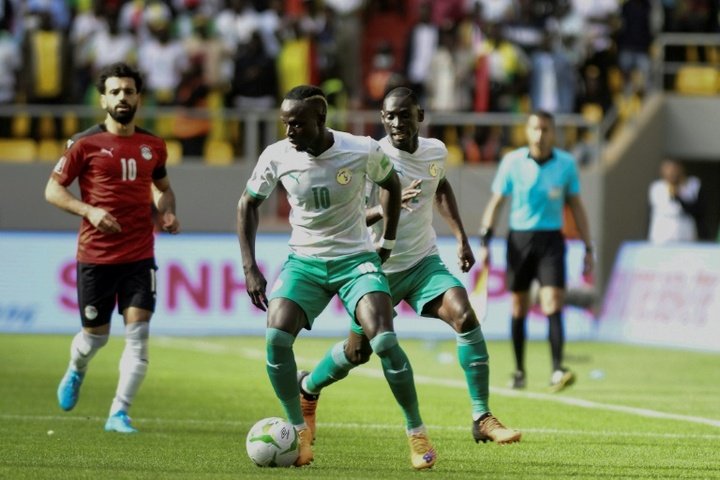 Senegal beat Egypt on penalties in their play-off. AFP