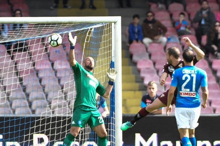 Napoli draw all but hands title to Juventus