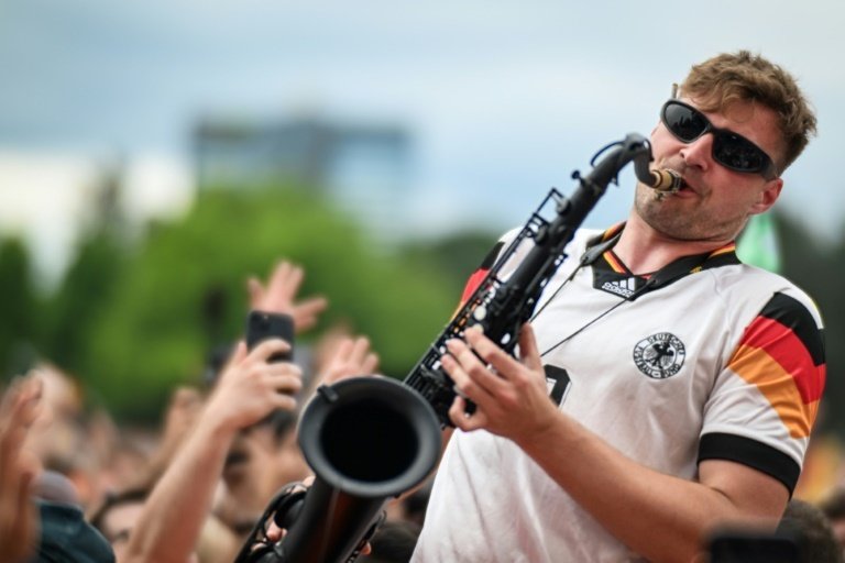 German fans dance to the tune of the 'saxophone guy' at Euro 2024