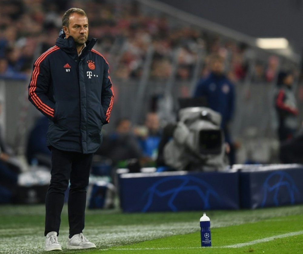 Interim coach Hansi Flick will remain in charge of Bayern Munich . AFP