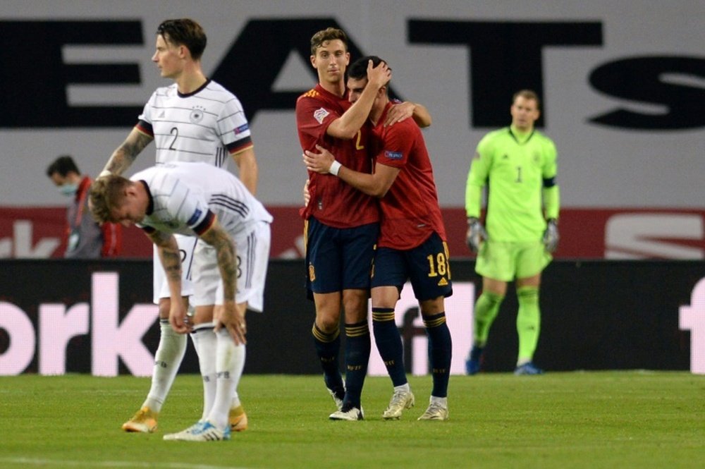 Ferran Torres (R) scored three as Spain thrashed Germany 6-0. AFP