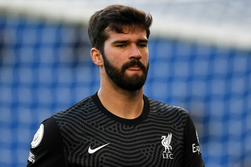 Alisson adds to Liverpool injury woes. AFP