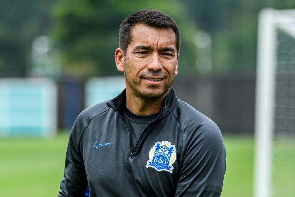 Testing times make ex-Barca star van Bronckhorst 'a stronger person'. AFP