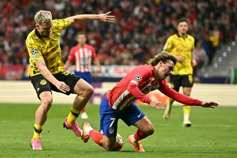 Griezmann expects Atletico Madrid will suffer in the second leg at Borussia Dortmund. AFP