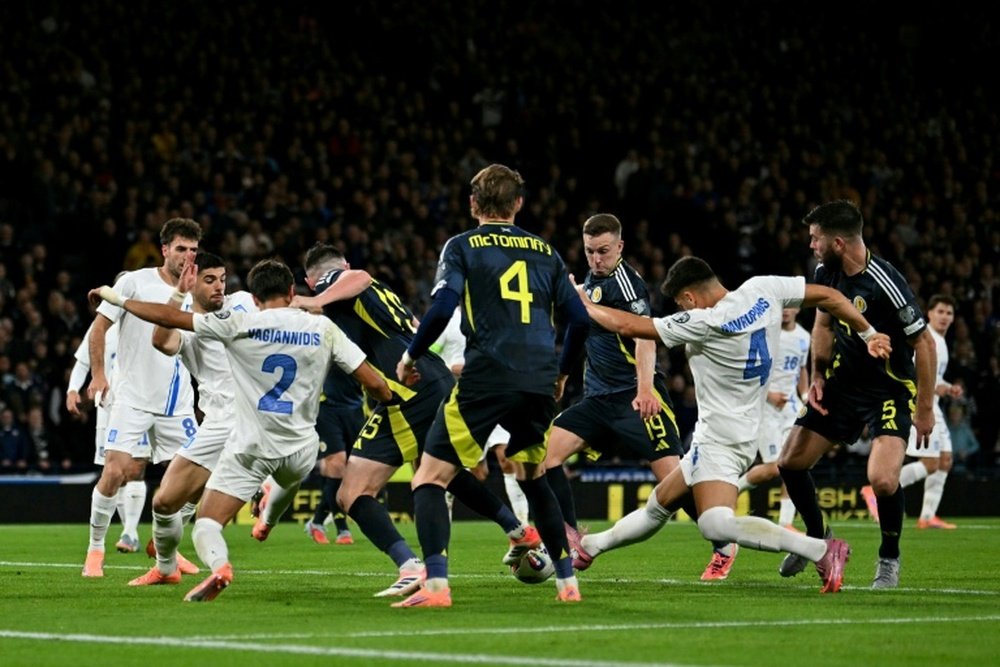 Ferguson opened his account for Scotland. AFP
