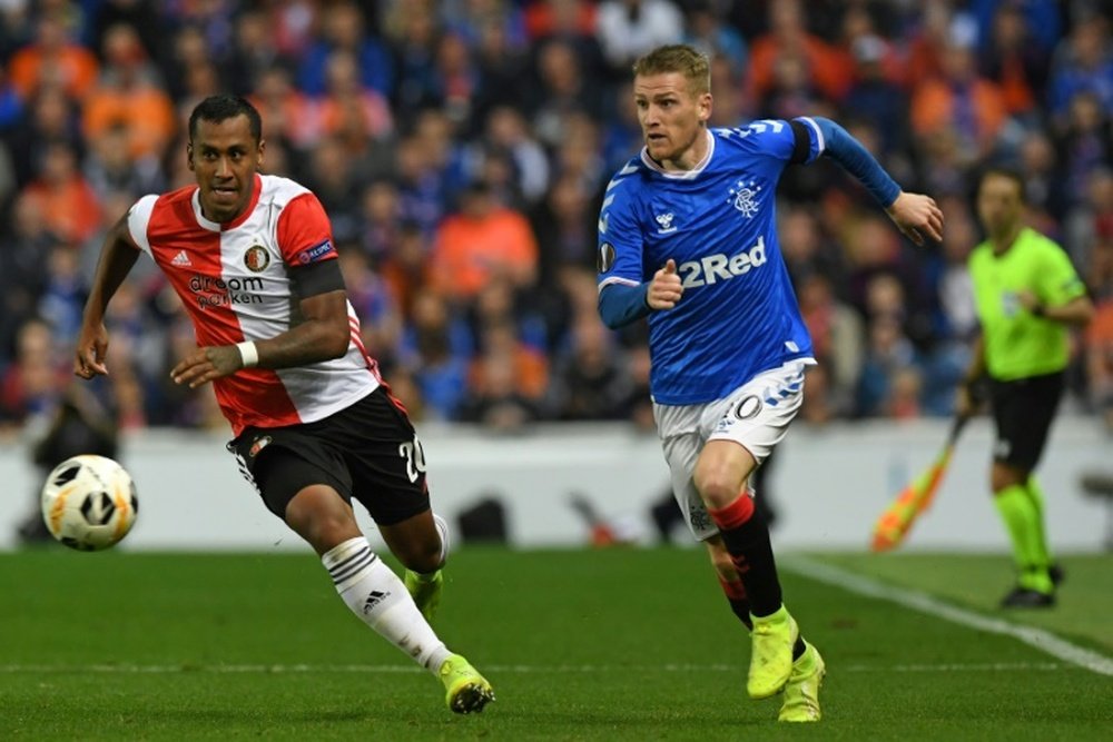 Steven Davis (R) has announced his retirement. AFP