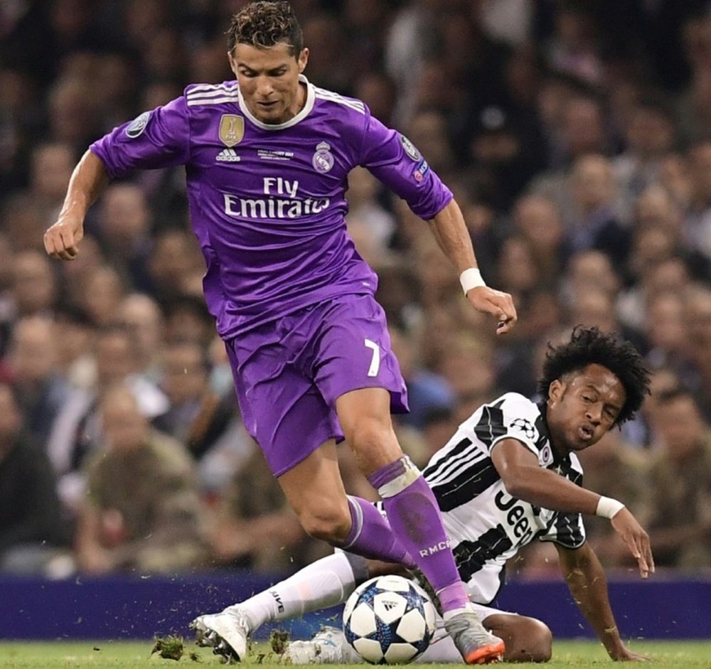 Ronaldo has taken the number 7 shirt off Cuadrado. AFP