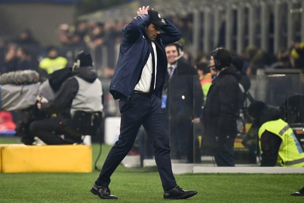 Inter coach Conte is disapointed at having to play behind closed doors. AFP