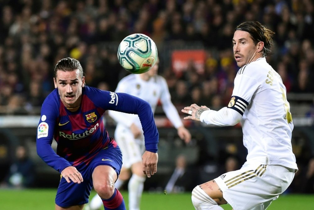 Barca and Real continue title tussle ahead of Super Cup. AFP