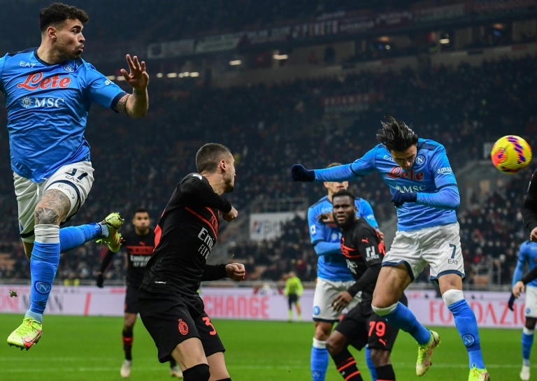 ï»¿Napoli squeeze past Milan to reignite title push